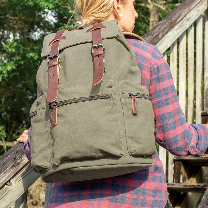 Outback Traveler Green Rucksack - Canvas Construction, Soft Lining, Spacious Interior, Leather Accents, Multiple Pockets, Metal Hardware