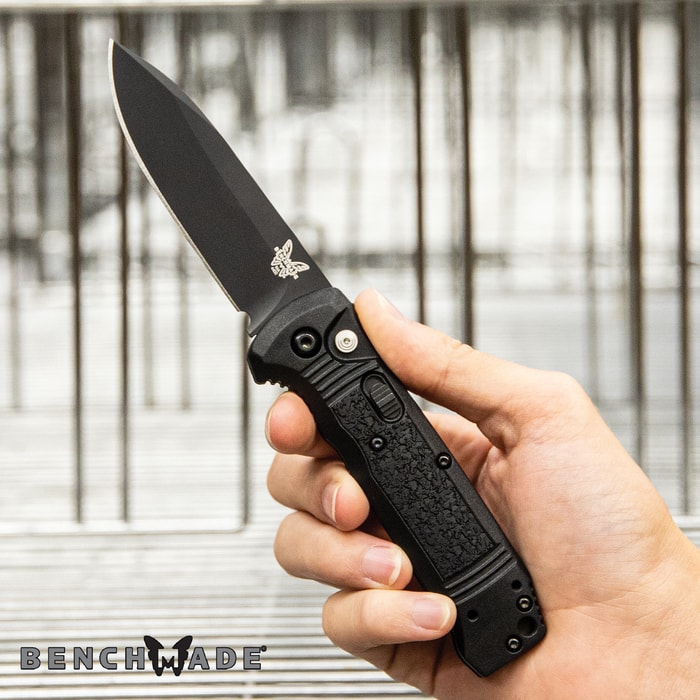 The Benchmade Casbah Automatic Knife has a push button to deploy the blade