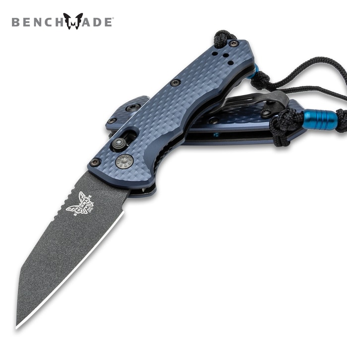 Benchmade Immunity Automatic Knife with CPM-M4 stainless steel Wharncliffe blade shown open with black lanyard.