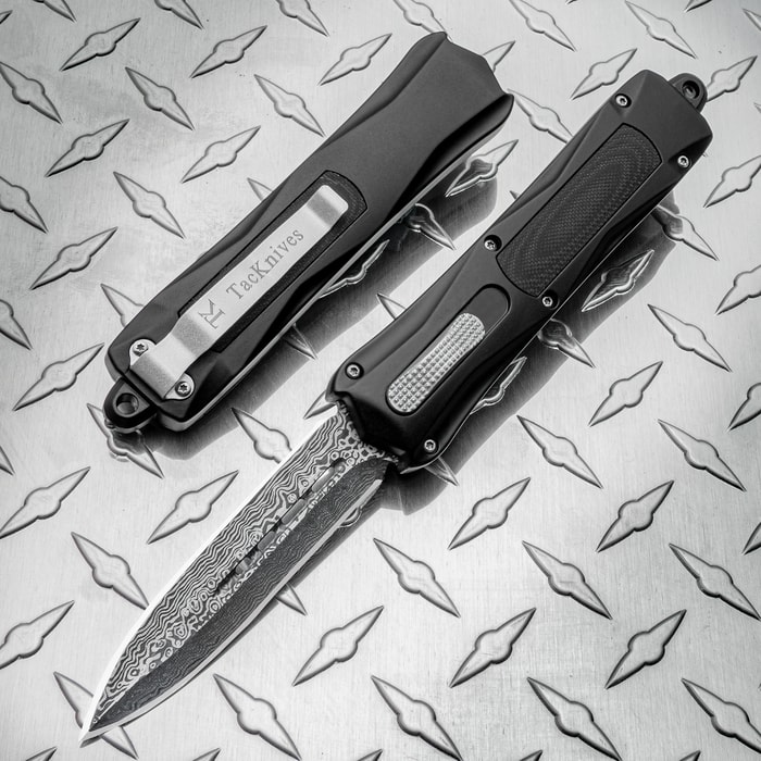 The TacKnives OTF Double Action Safety Knife on display in its open and closed position