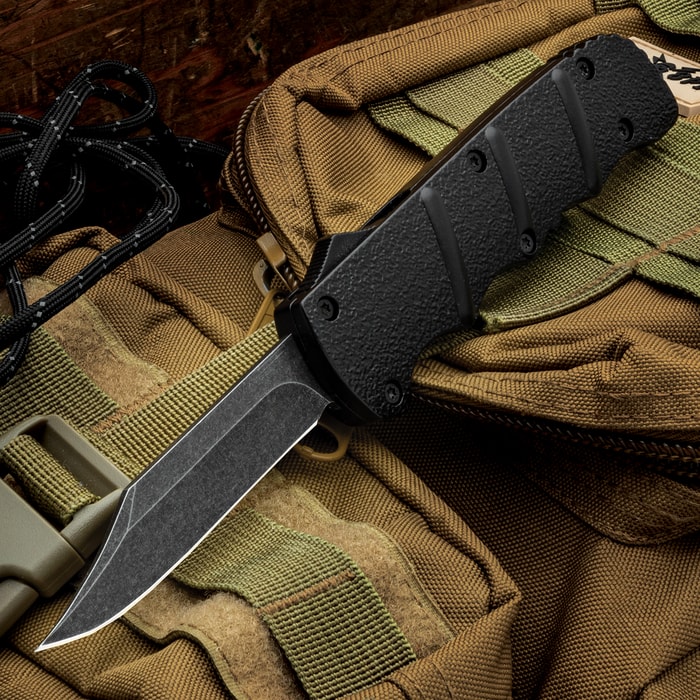 The Black Jacket OTF Automatic Knife in its open position