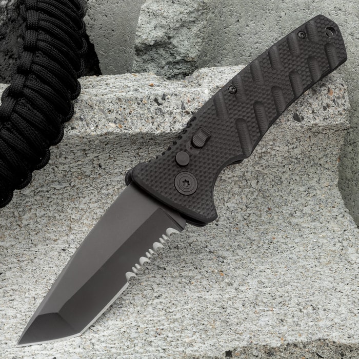 A view of the Black Serrated Automatic Knife in the open position