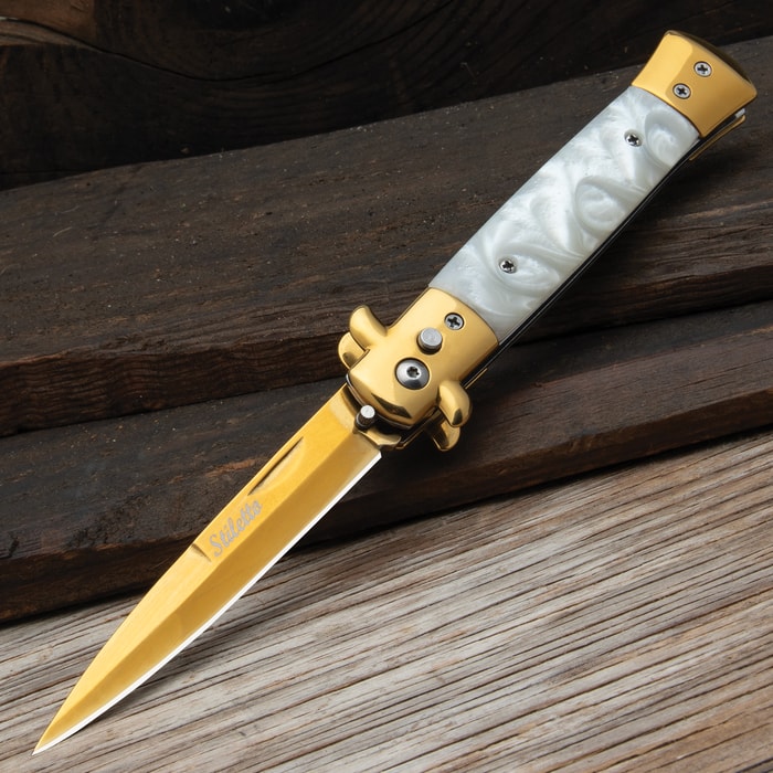 The Gold Stiletto Auto Knife in its fully deployed position