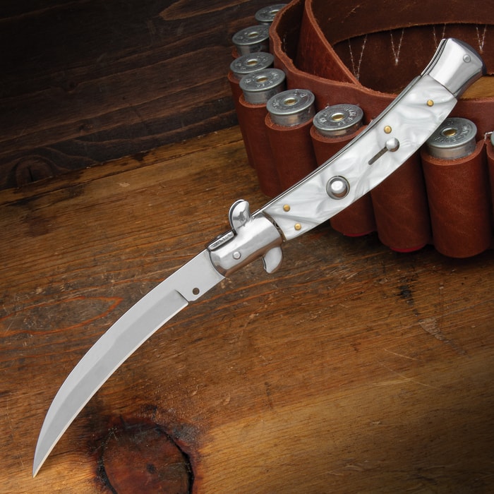 The Pearl Curl Automatic Stiletto Knife shown open with uniquely curved stainless steel blade and pearl handle.