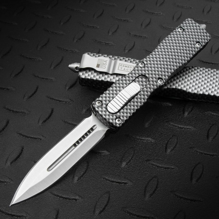 The Silver Dagger Automatic OTF Knife with silver carbon fiber handle and stainless steel blade, shown both opened and closed.