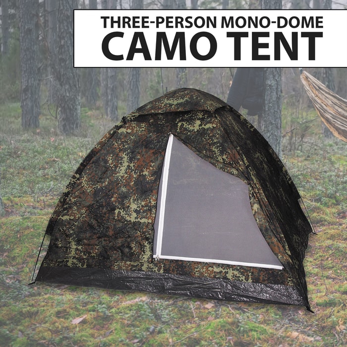 The Three-Person Camo Monodome Tent pitched in the woods