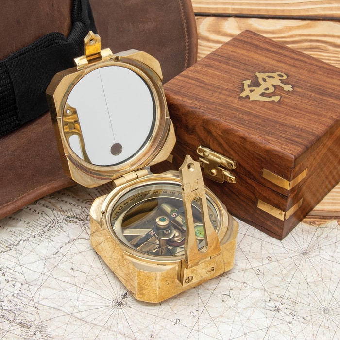 The Brass Brunton Compass shown with its wooden box