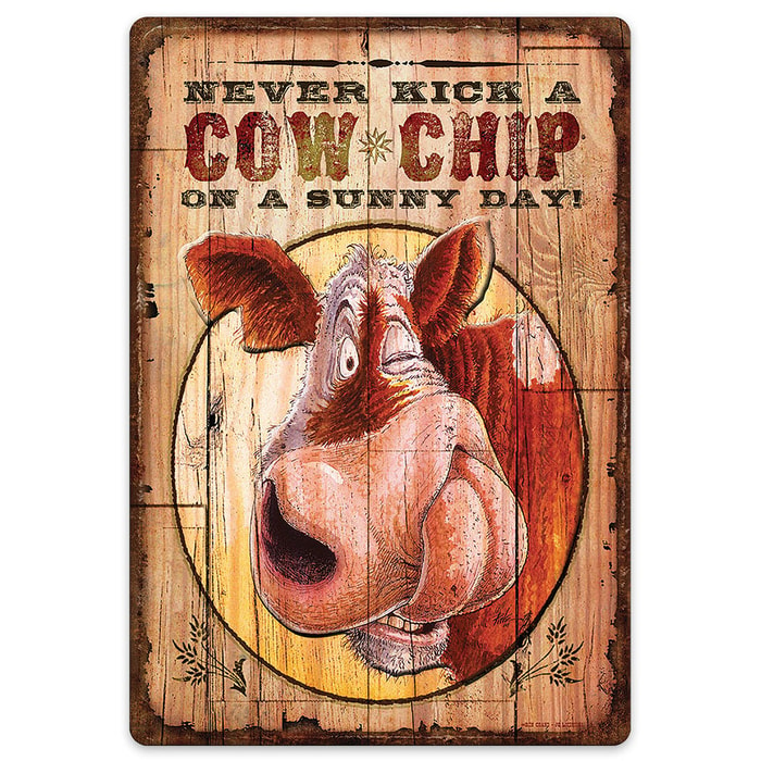 Never Kick A Cow Chip Tin Sign