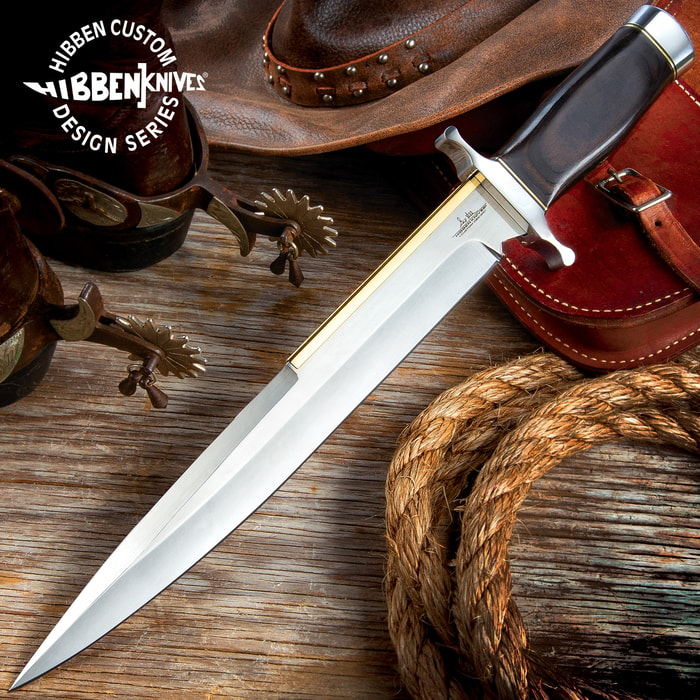 Gil Hibben Old West Toothpick Bowie Knife has a 11 7/8” stainless steel blade and classic hardwood handle.
