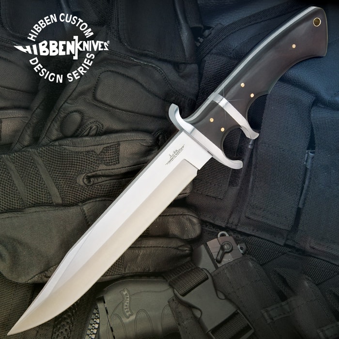 Gil Hibben Assault Tactical Knife has a full-tang 7Cr17 stainless steel clip point blade and Micarta trigger-grip handle.
