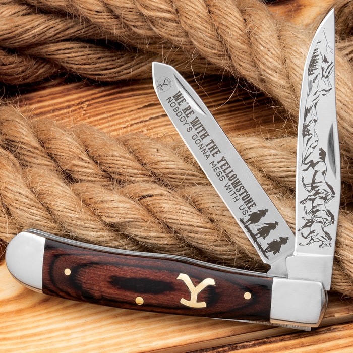 Our Ranch Hand Trapper Pocket Knife has Yellowstone themed artwork