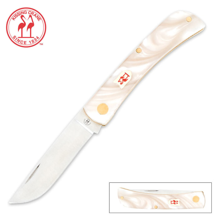 Kissing Crane Pearl Pocket Farmer Knife has a stainless steel blade with nail nick and an imitation pearl handle.