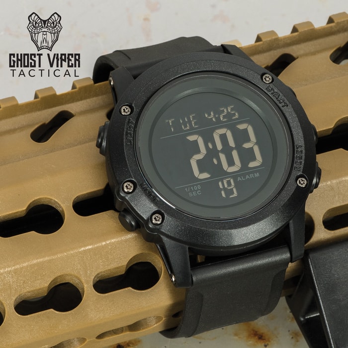 This black tactical, digital watch has loads of features including 12/24 hour time, auto calendar, alarms and count down