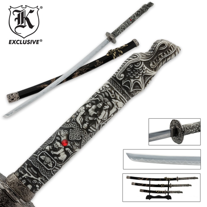 K Exclusive three piece samurai sword set shown on wooden display, with ornate scabbard, and detailed look of dragon handle. 