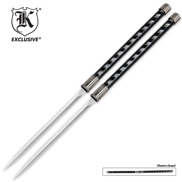 Twin Ninja Sword Sticks shown side-by-side with decorative metal handles and 15” 440 stainless steel blades. 