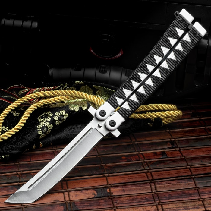 The Black Samurai Butterfly Knife in its deployed position