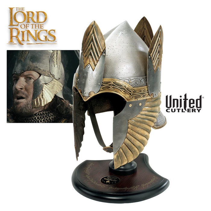 The Lord of the Rings Helm of Isildur crafted with iron and brass decorations sits on a wooden display aside a photo of the character in the helm. 
