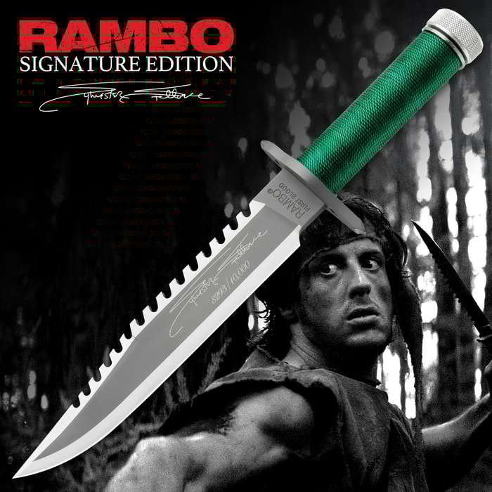 The Rambo I Signature Edition Knife shows an engraved signature and edition number. It features a sharp serrated spine, green cord-wrapped handle, and a partial view of the brown leather sheath.