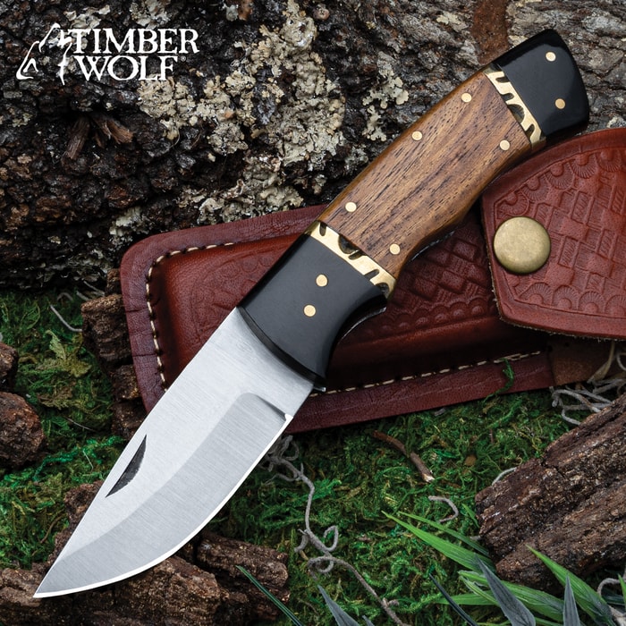 The Timber Wolf Trail Rider Pocket Knife deployed with its pouch