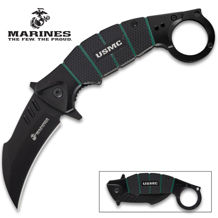 Black USMC karambit knife with curved blade and finger ring