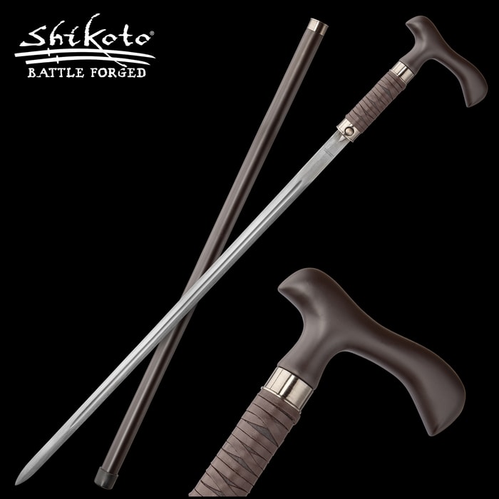Close view of damascus steel blade cane with a leather wrapped handle laying next to brown scabbard to conceal