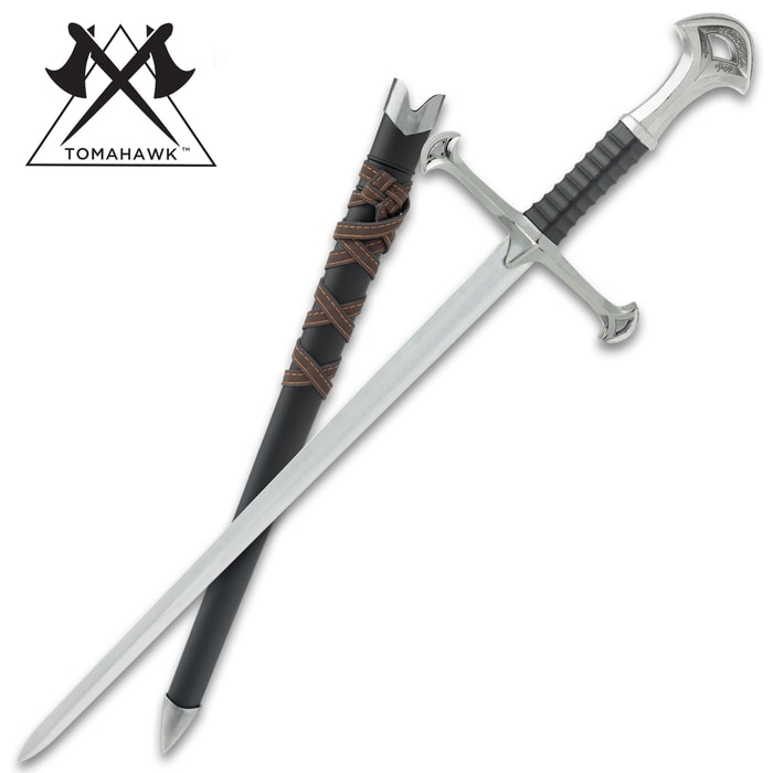 Close view of Medieval warrior short sword with black sheath wrapped in brown leather belt and a pewter metal alloy cross shaped handle and guard