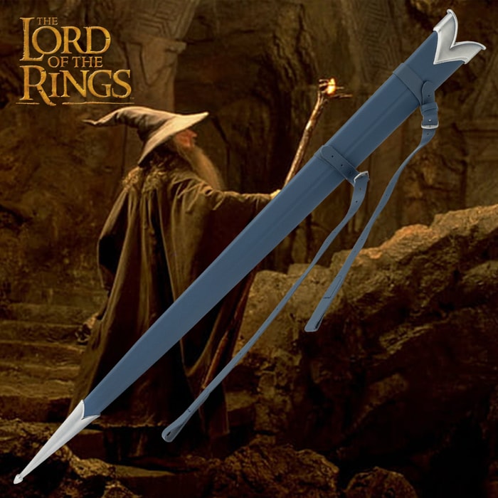 United Cutlery Brands Lord of the Rings black glamdring scabbard featuring leather straps and metal tip; also shown attached to belt by leather straps with sword inside. 