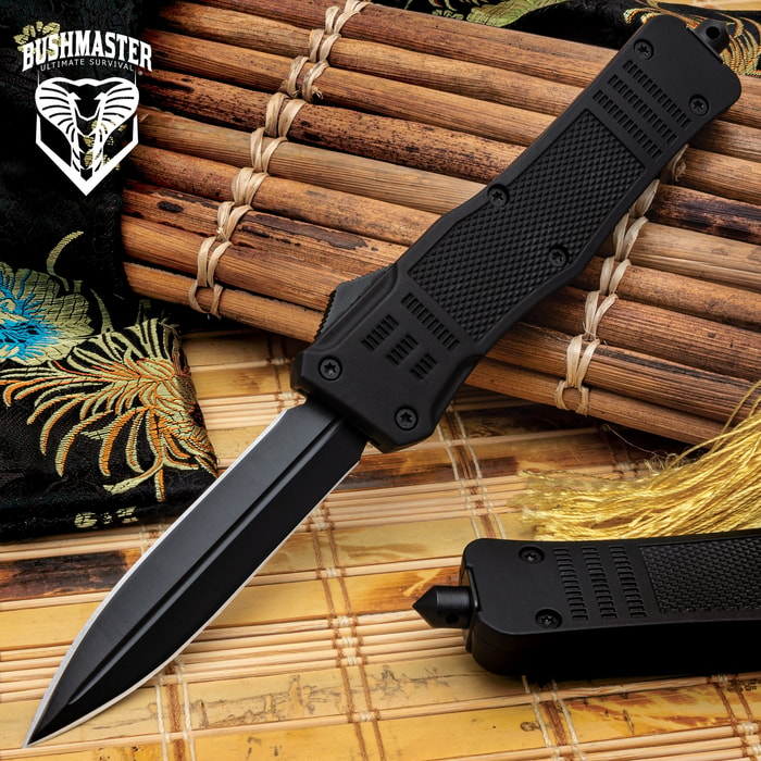 Bushmaster Mamba Automatic OTF Knife shown with stainless steel double-edged blade with black finish and textured TPU handle.