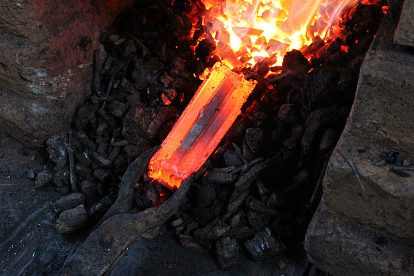 Folded layers of steel being forged